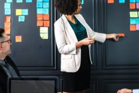 a woman presenting workplace performance data